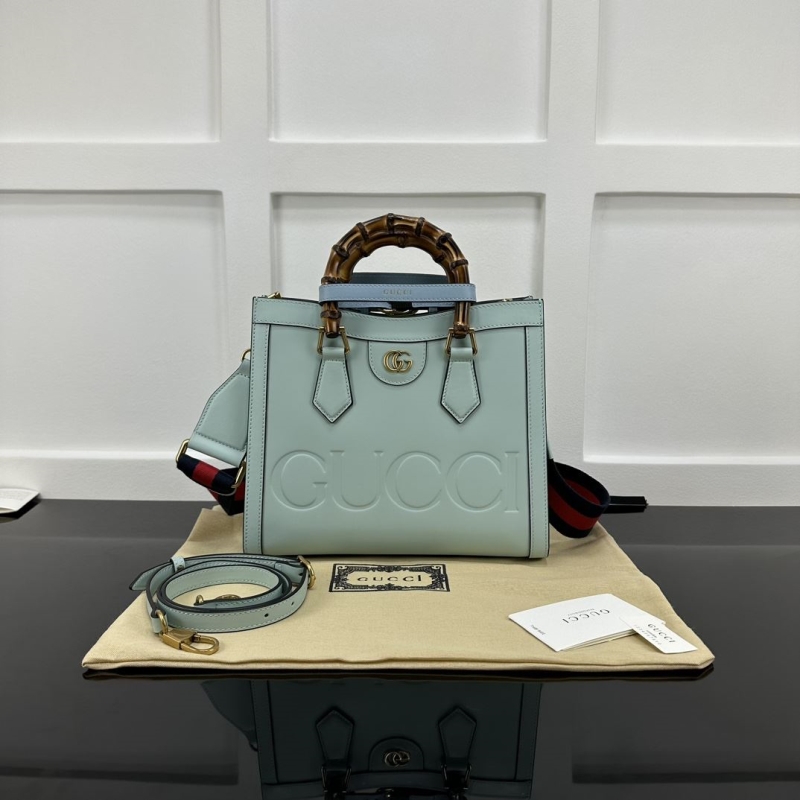 G*u*i top handle bags